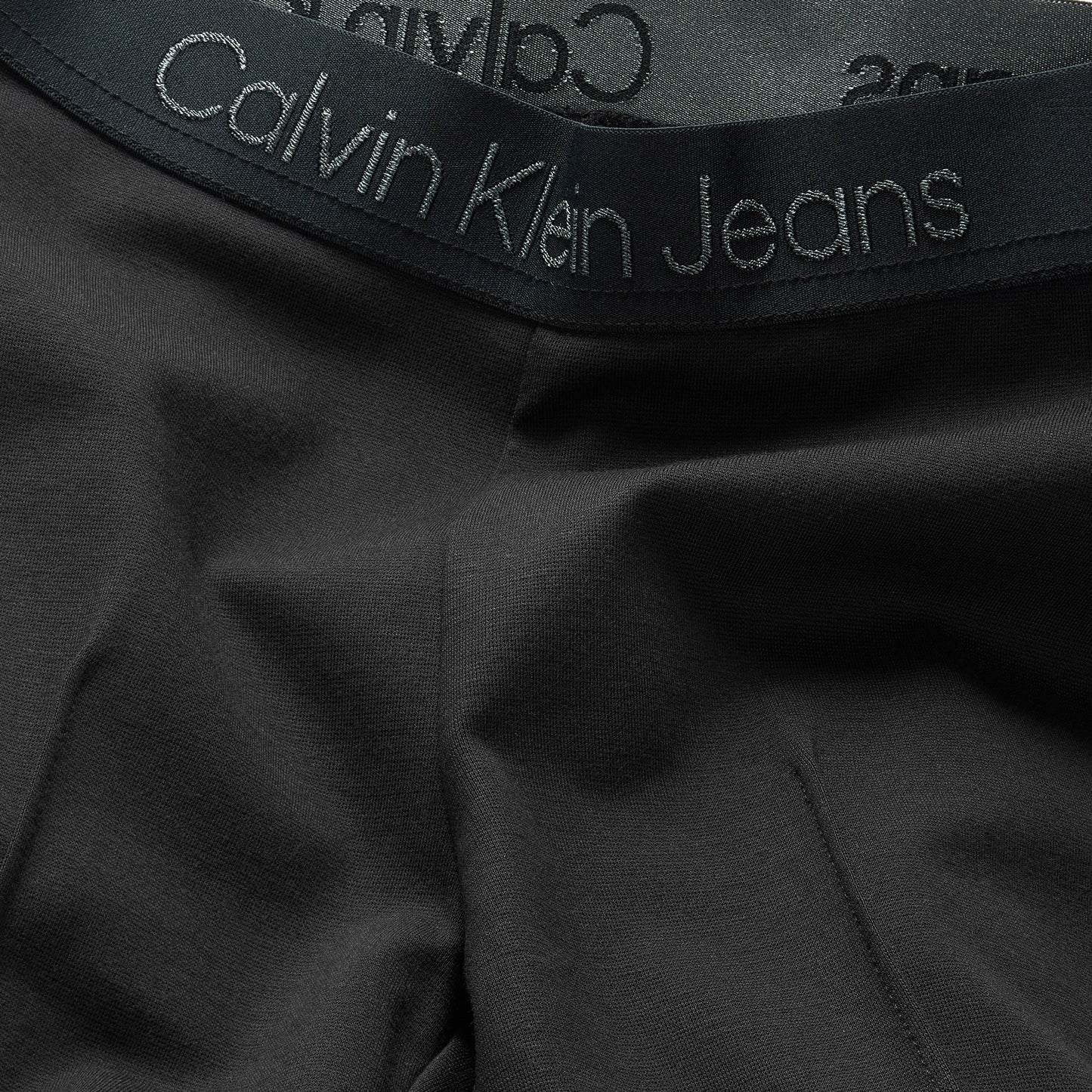 Leggins con vestibilità svasata e logo lettering sul girovita