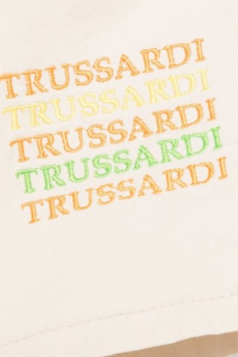 Bermuda da neonato con multi logo lettering ricamato sul fondo TIP25023BE