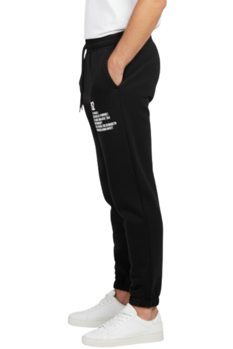 Pantaloni tuta da uomo in felpa con stampa lettering a contrasto sulla gamba sinistra SS26270