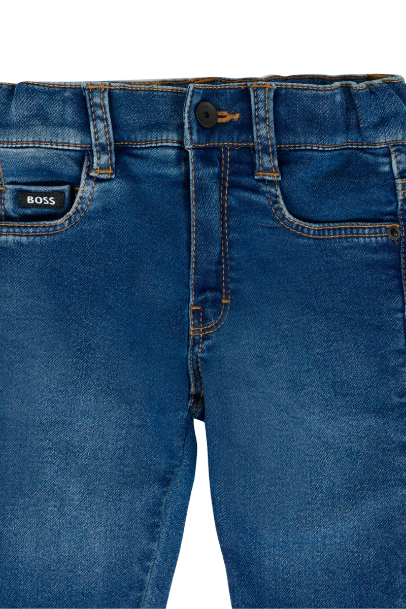 Jeans da neonato in denim di cotone elasticizzato a cinque tasche J52439