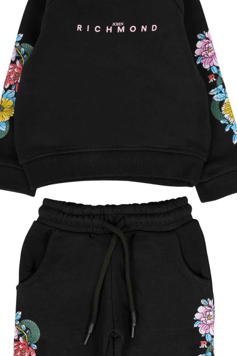 Tuta da neonata in cotone garzato con stampa decorazioni floreali ai lati RIA25065CF