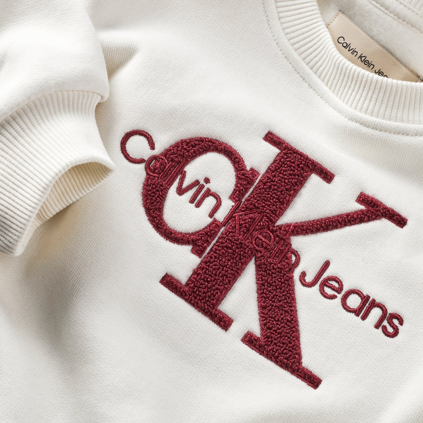 Felpa girocollo da ragazza taglio lungo con maxi logo monogram al centro