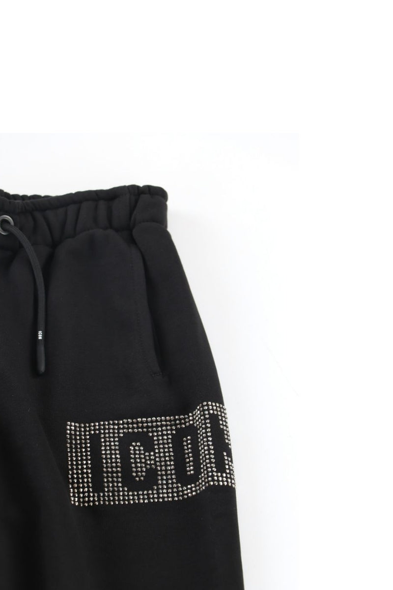 Pantaloni tuta da ragazza con logo lettering e strass a sinistra IGSP00908